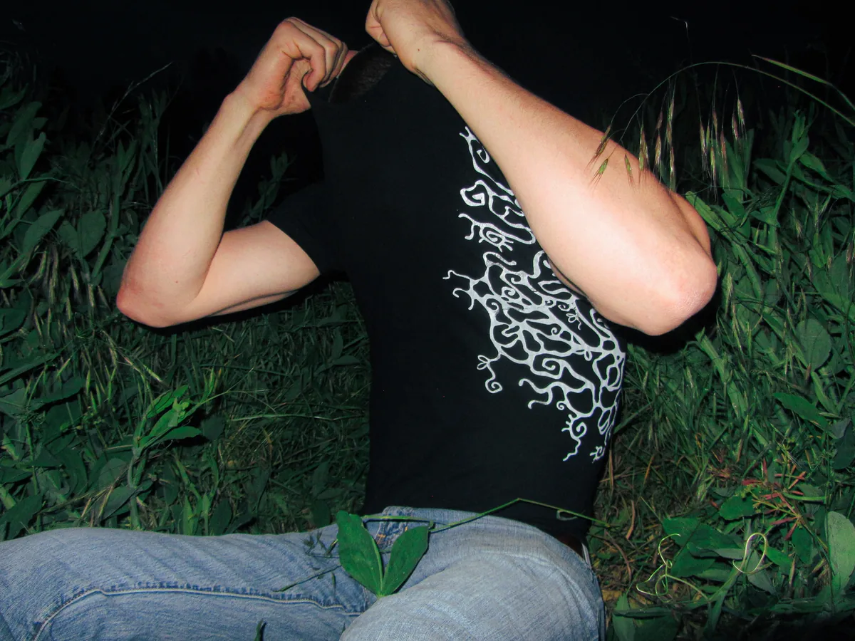 Model showing Tendril sigil on t-shirt